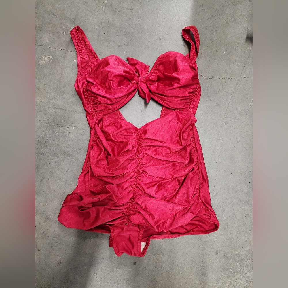 Retro swimsuit from pinup girl clothing. Red one piece with rouched bottom